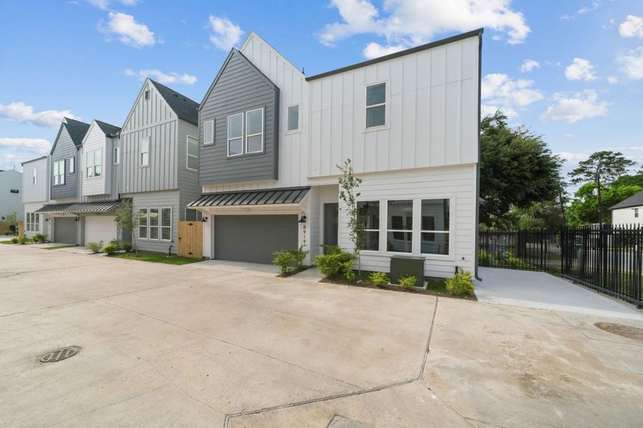 Front exterior of a new home in , Houston, TX, highlighting curb appeal (Image 25).