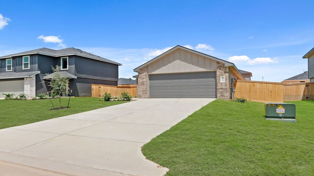 Representative exterior photo of a completed home built from the Plan by D.R. Horton in Lexington Heights, Willis, TX (Image 2).
