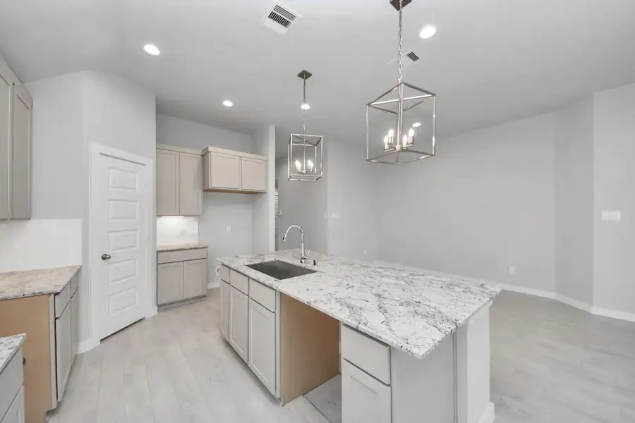 This generously spacious kitchen is a dream realized!