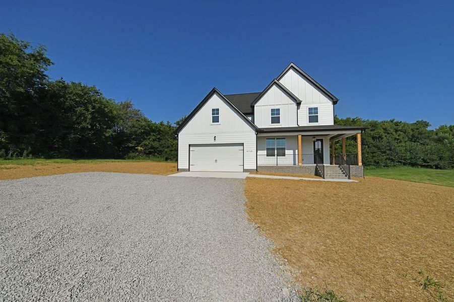 Front exterior of a home in the Starks Estates community, located in Cross Plains, TN (Image 10).