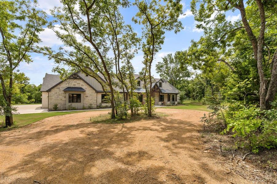 Front exterior of a new home in , Van Alstyne, TX, highlighting curb appeal (Image 19). Front exterior of a new home in , Van Alstyne, TX, highlighting curb appeal (Image 19).