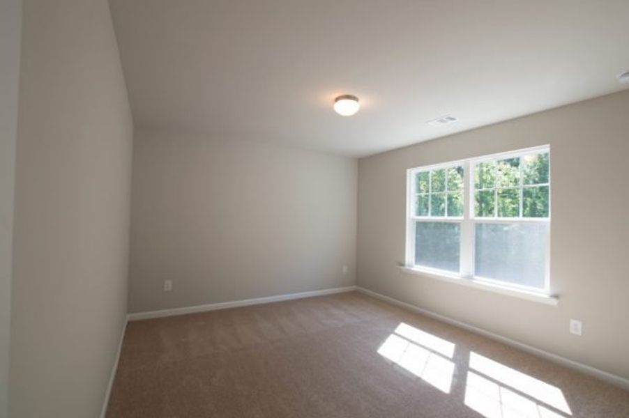 Representative unfurnished interior of a home built from the Laurel by Piedmont Residential in The Reserve at Willow Oaks, Canton (Image 29).