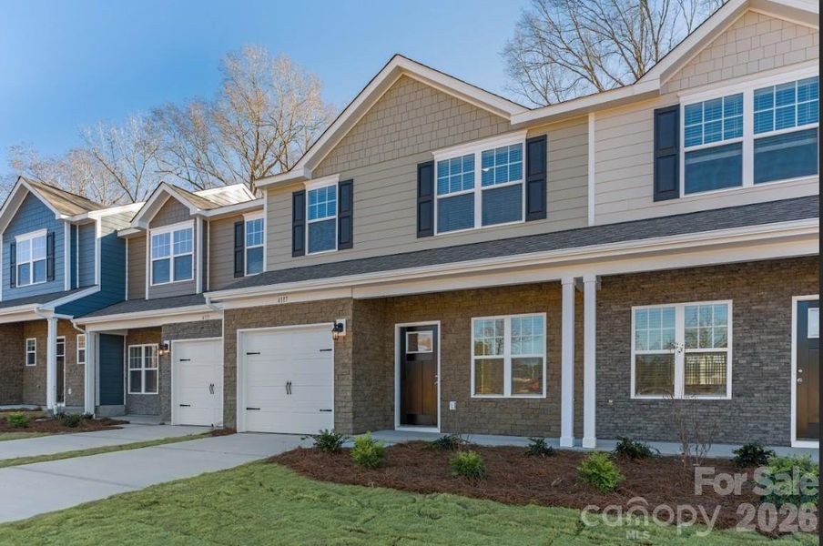 Front exterior of a new home in Sierra Ridge, Gastonia, NC, highlighting curb appeal (Image 2). Front exterior of a new home in Sierra Ridge, Gastonia, NC, highlighting curb appeal (Image 2).