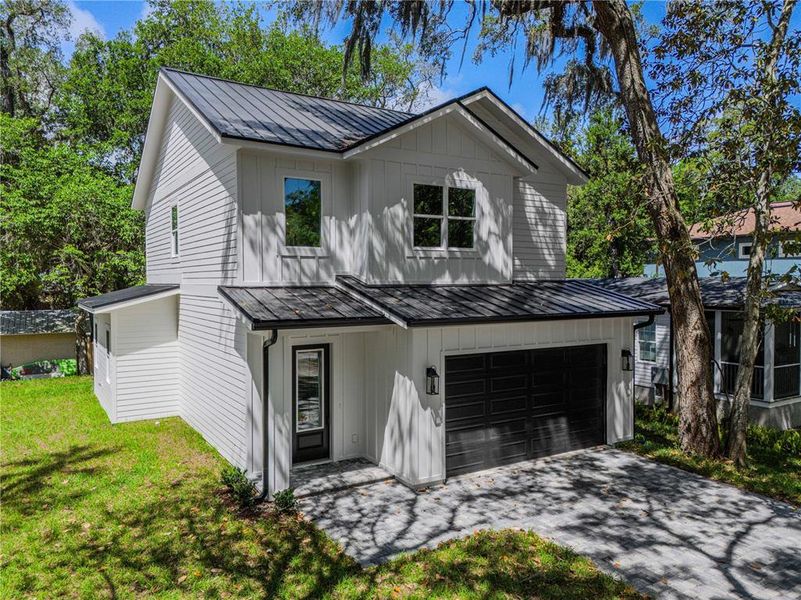 Front exterior of a new home in , Palm Coast, FL, highlighting curb appeal (Image 30).