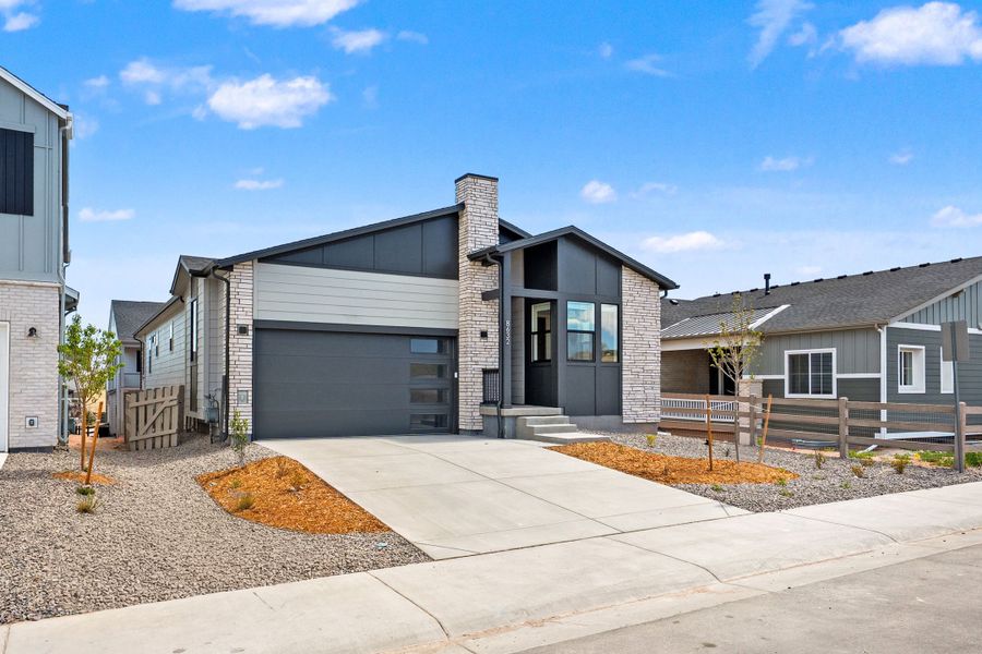 Front exterior of a new home in Trumark Homes at Sterling Ranch, Littleton, CO, highlighting curb appeal (Image 2).