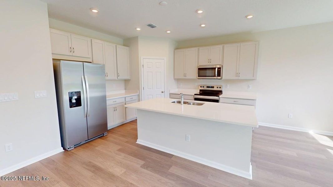 Furnished interior view inside a new home in Sandridge Hills, Green Cove Springs (Image 6).
