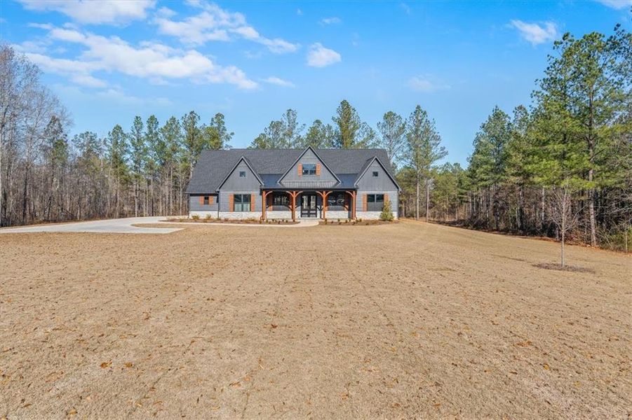 Front exterior of a new home in , Bremen, GA, highlighting curb appeal (Image 22). Front exterior of a new home in , Bremen, GA, highlighting curb appeal (Image 22).