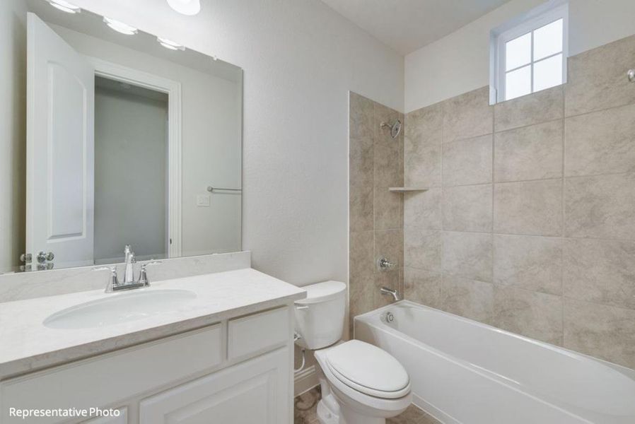 Representative furnished interior of a home built from the Hartford II by Grand Homes in Edgewater, Fate (Image 9).