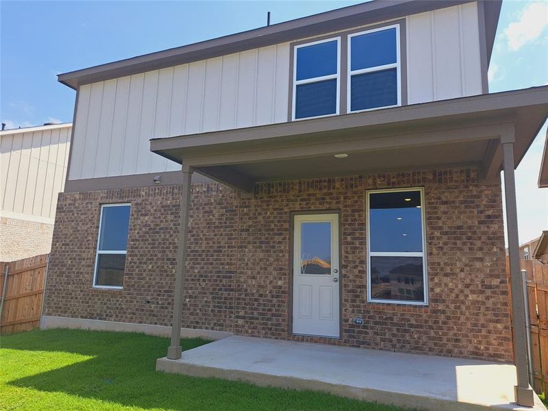 Front exterior of a new home in Sunfield, Buda, TX, highlighting curb appeal (Image 17). Front exterior of a new home in Sunfield, Buda, TX, highlighting curb appeal (Image 17).