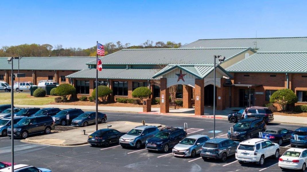 Front exterior of a new home in Haven Abbey, Cumming, GA, highlighting curb appeal (Image 46). Front exterior of a new home in Haven Abbey, Cumming, GA, highlighting curb appeal (Image 46).