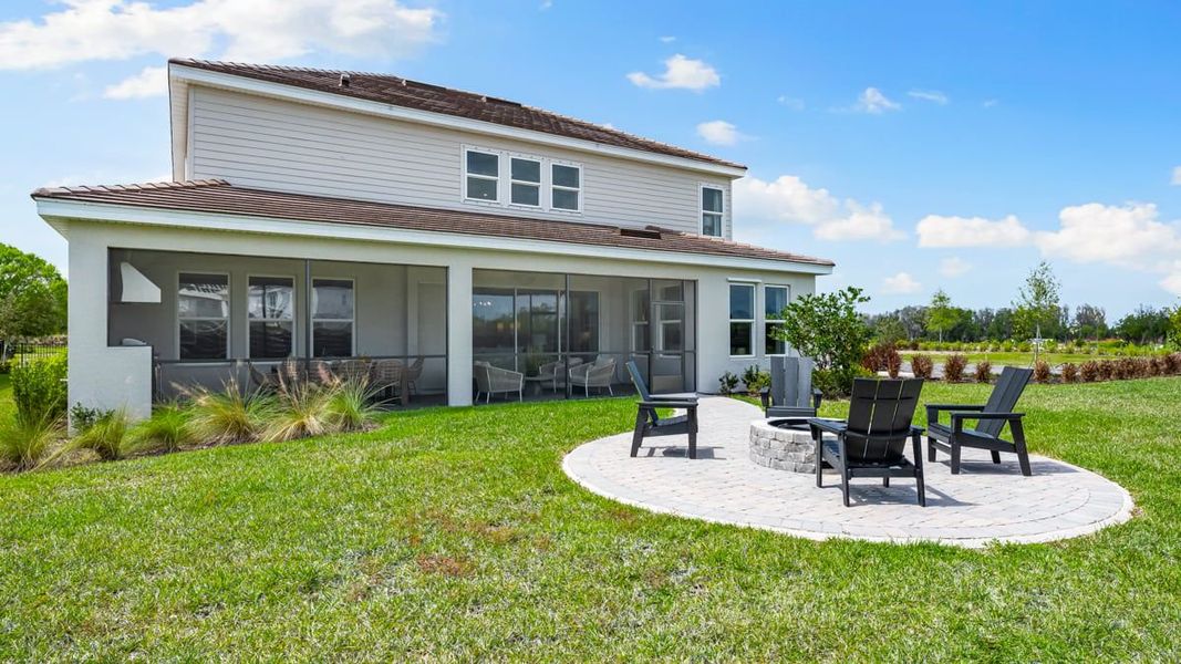 Representative exterior photo of a completed home built from the Sand Key by Taylor Morrison in Victoria Lakes, Odessa, FL (Image 22).