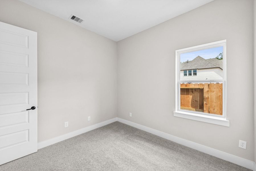 Spacious, unfurnished interior of a new home in The Highlands 40', Porter (Image 18).