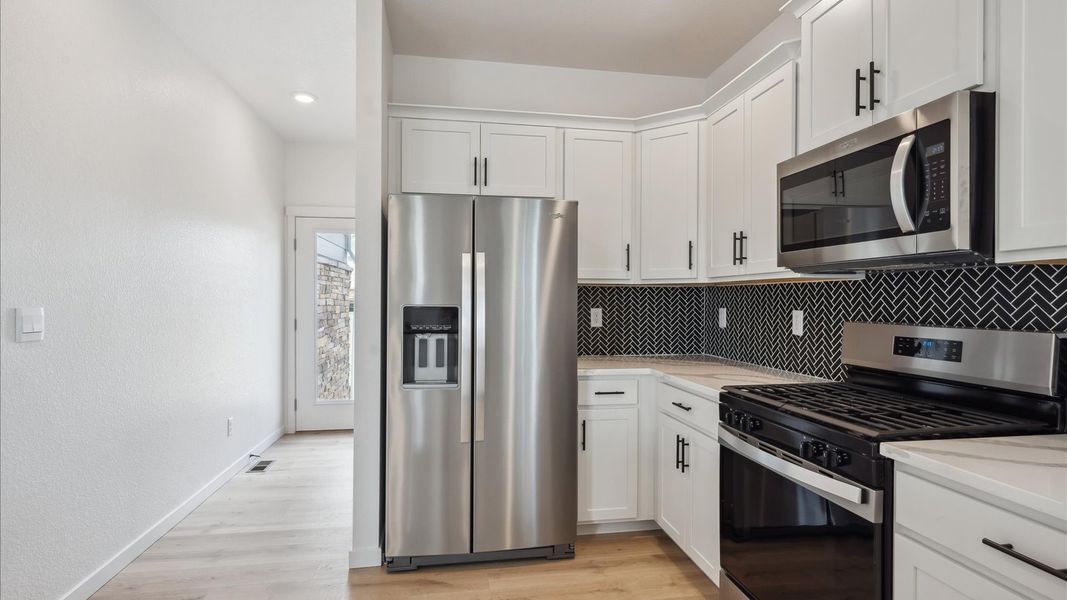Representative furnished interior of a home built from the Alamosa by D.R. Horton in Sky Ranch, Watkins (Image 9). Representative furnished interior of a home built from the Alamosa by D.R. Horton in Sky Ranch, Watkins (Image 9).