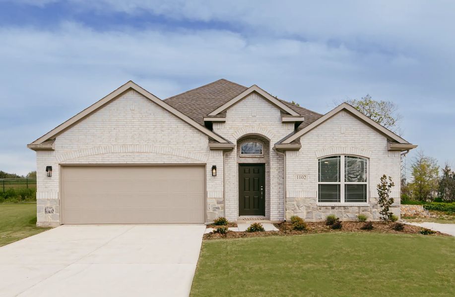 Representative exterior photo of a completed home built from the Silvermist by Stonehollow Homes in Heritage Grove, Blue Ridge, TX (Image 2). Representative exterior photo of a completed home built from the Silvermist by Stonehollow Homes in Heritage Grove, Blue Ridge, TX (Image 2).