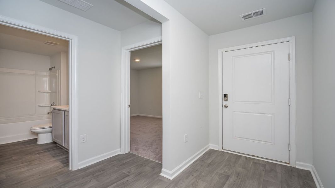 Representative unfurnished interior of a home built from the KERRY by D.R. Horton in Stanbury Creek, Supply (Image 13).