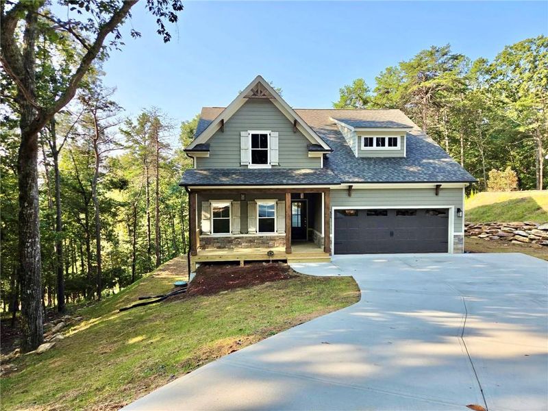 Front exterior of a new home in , Waleska, GA, highlighting curb appeal (Image 15).