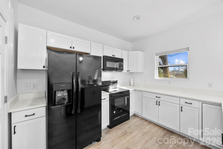 Furnished interior view inside a new home in , Charlotte (Image 8).