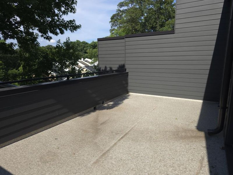 Exterior details and patio area of a home in Overlook at Moda, Decatur (Image 24). Exterior details and patio area of a home in Overlook at Moda, Decatur (Image 24).