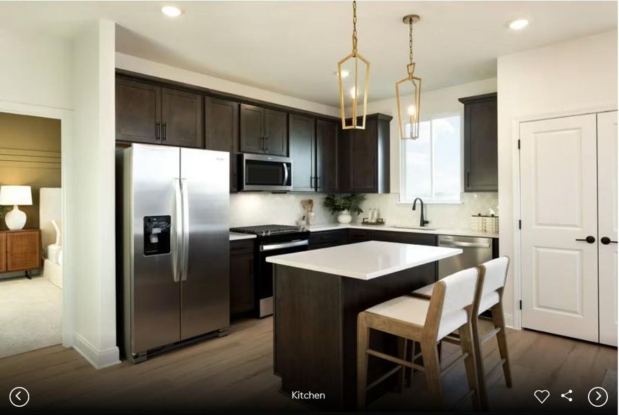 Interior photos- Photo of Pulte model home with same floor plan, not of actual home listed.