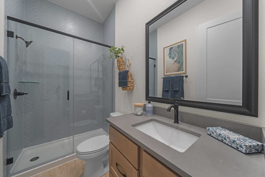 Representative furnished interior of a home built from the Hampton by Chesmar Homes in Meridiana 50's and 60's, Manvel (Image 7).