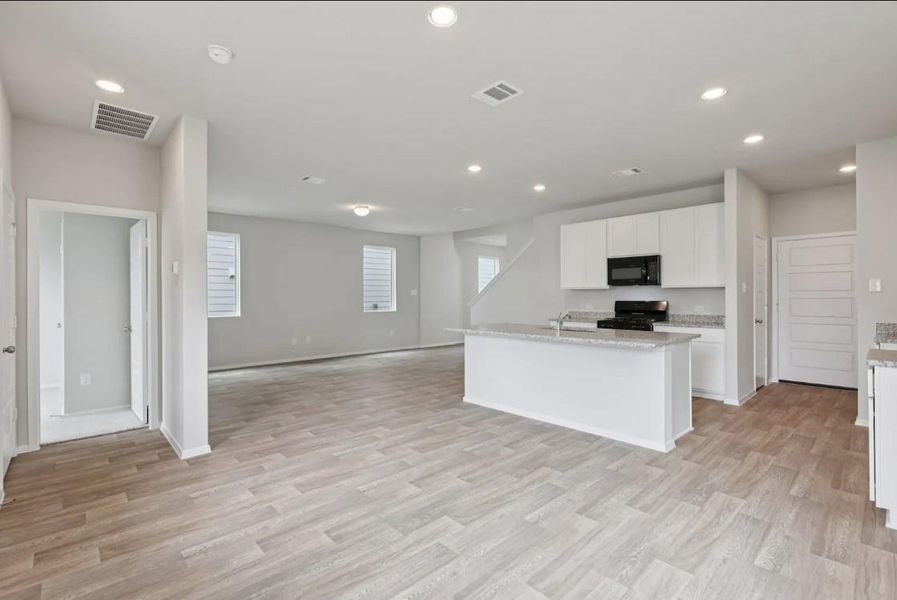 Furnished interior view inside a new home in Azalea, Pattison (Image 9).