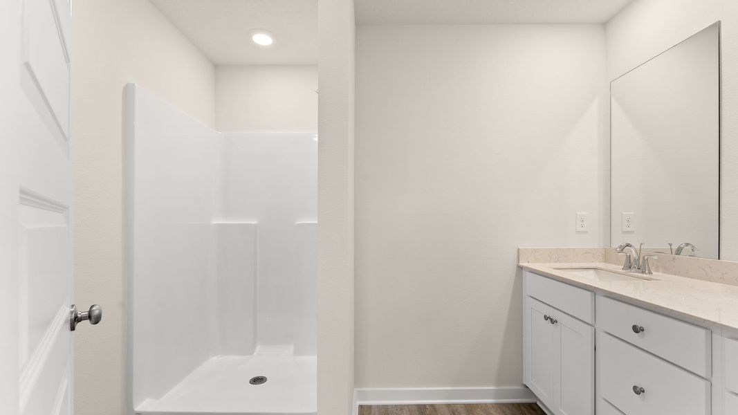 Furnished interior view inside a new home in Genoa Landing Townhomes, Freeport (Image 12).