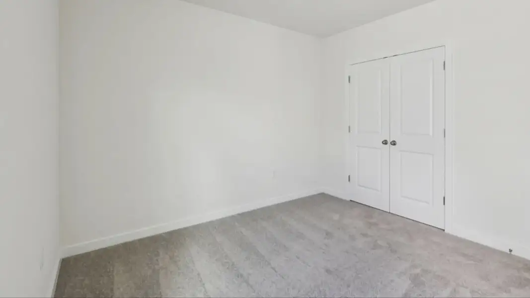 Bedroom in the Baker by DRB Homes in Willowbrook North