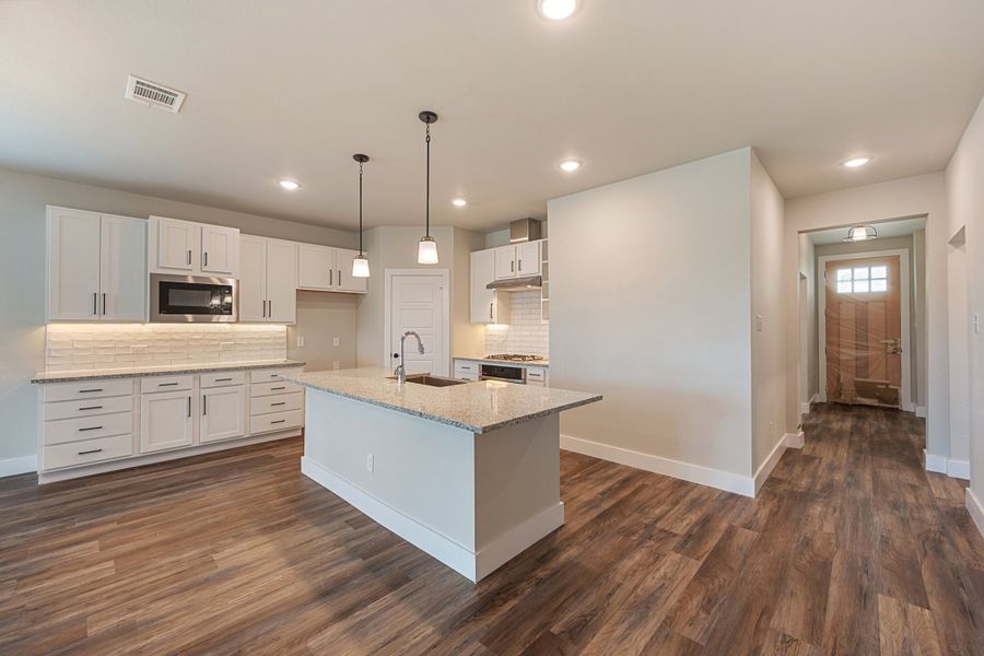 Representative furnished interior of a home built from the Isibelle by Heritage Towne in Heritage Towne, Midlothian (Image 13).