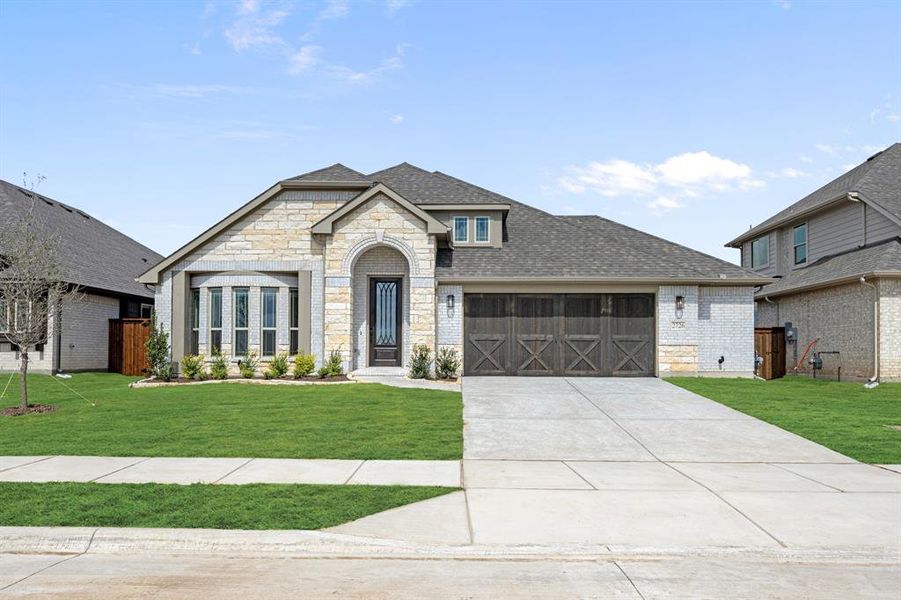 Front exterior of a new home in Meraki, Forney, TX, highlighting curb appeal (Image 24).