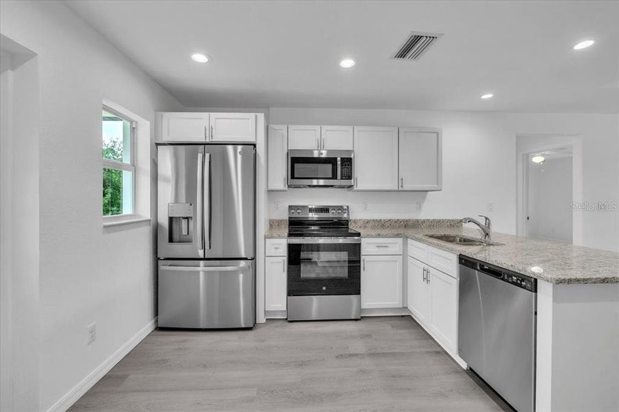 Furnished interior view inside a new home in , Punta Gorda (Image 11).