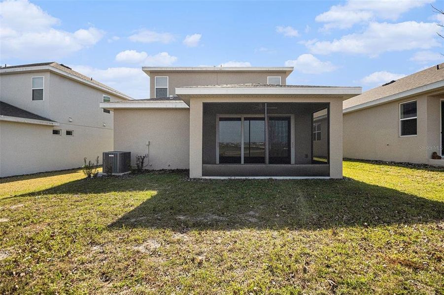 Exterior details and patio area of a home in Hills of Minneola, Minneola (Image 23).