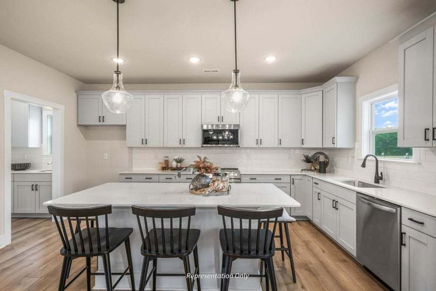 The Cary Kitchen featuring Multi-Sided Island for Additional Seating