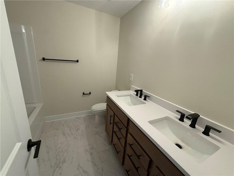 Furnished interior view inside a new home in Rose Creek, Cumming (Image 4).