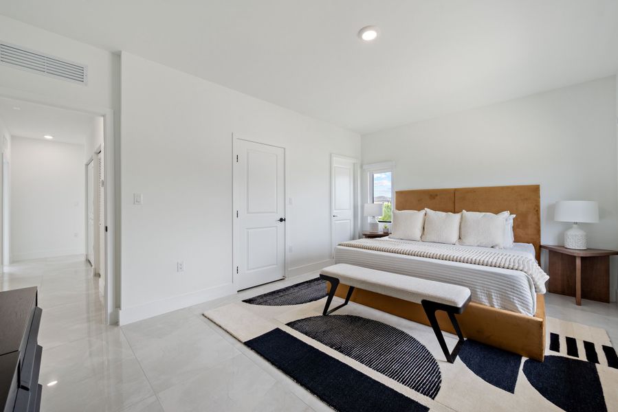 Representative furnished interior of a home built from the Model E by Onx Homes in On Alba, Florida City (Image 47).