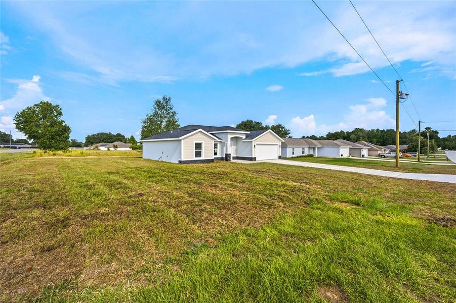 Front exterior of a new home in , Ocala, FL, highlighting curb appeal (Image 19).