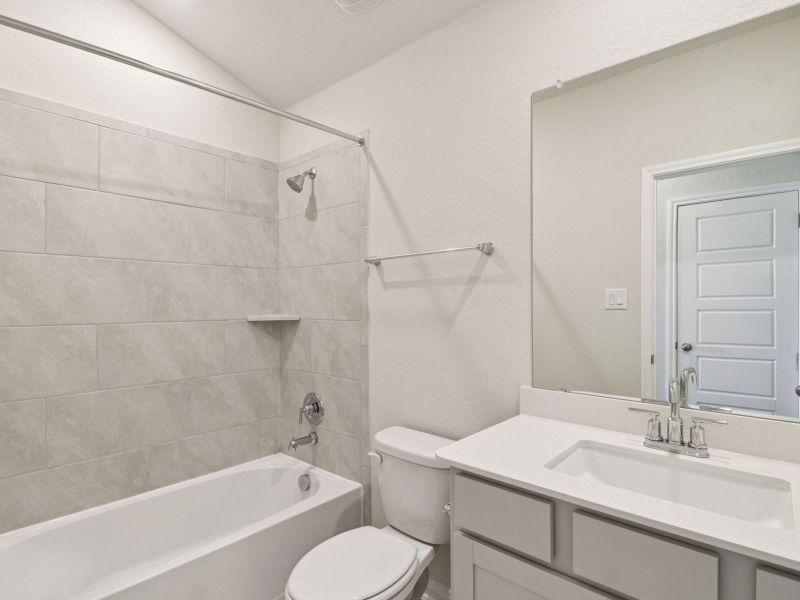 Guest bedroom in the Callaghan floorplan at a Meritage Homes community.