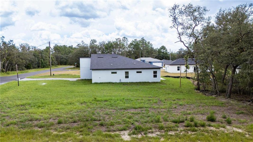 Front exterior of a new home in , Ocala, FL, highlighting curb appeal (Image 1).
