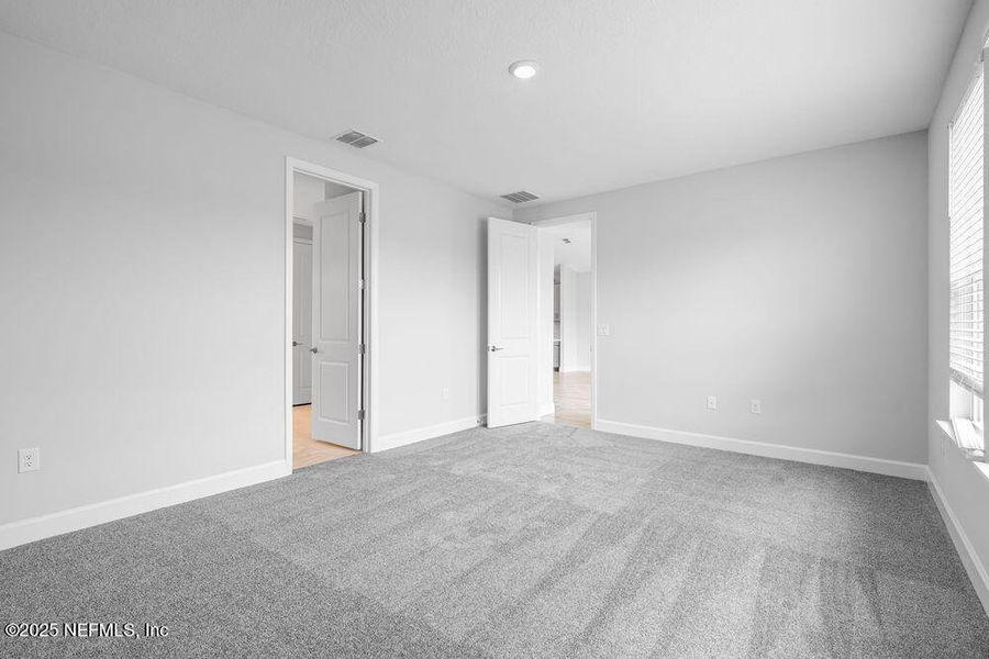 Spacious, unfurnished interior of a new home in Colbert Landings, Palm Coast (Image 26).