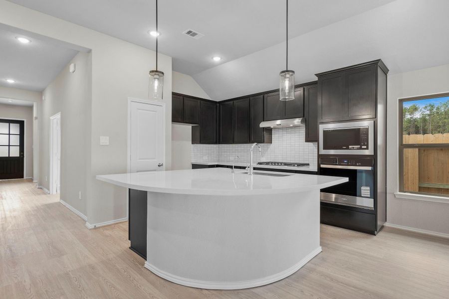 Furnished interior view inside a new home in The Highlands 45', Porter (Image 11).