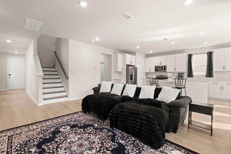 Furnished interior view inside a new home in Jasmine Point at Lakes of Cane Bay, Summerville (Image 7).