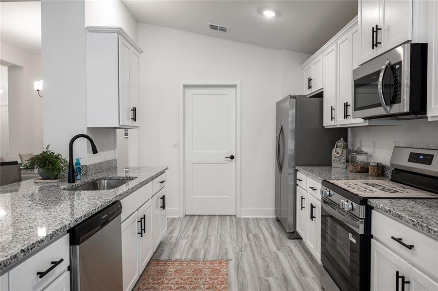 Furnished interior view inside a new home in Briarwood, Alachua (Image 2). Furnished interior view inside a new home in Briarwood, Alachua (Image 2).