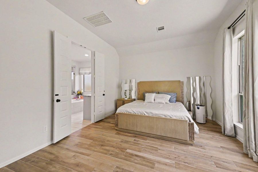 This primary retreat also has a private en suite. This primary retreat also has a private en suite.