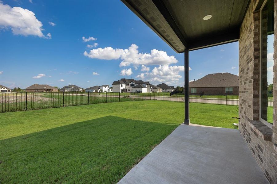 Exterior details and patio area of a home in Heath Golf and Yacht, Forney (Image 4).