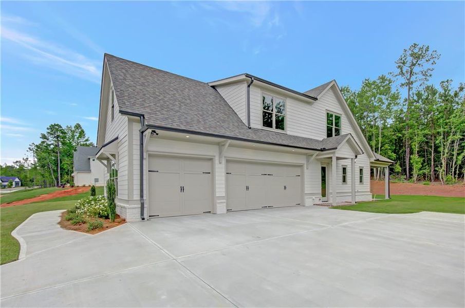 Front exterior of a new home in , Newnan, GA, highlighting curb appeal (Image 34). Front exterior of a new home in , Newnan, GA, highlighting curb appeal (Image 34).
