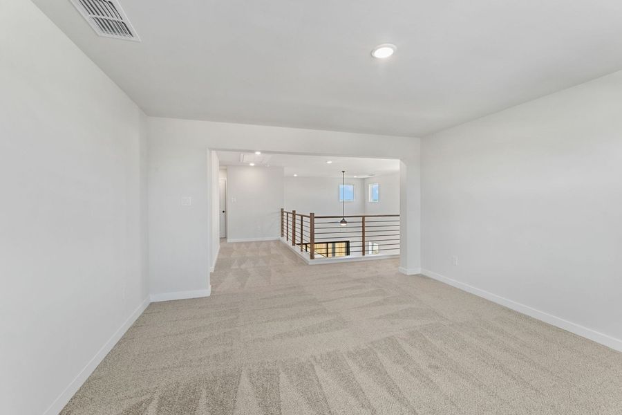 Representative unfurnished interior of a home built from the Poinsettia by Hakes Brothers in Hickory Ridge Estates, Elmendorf (Image 12).