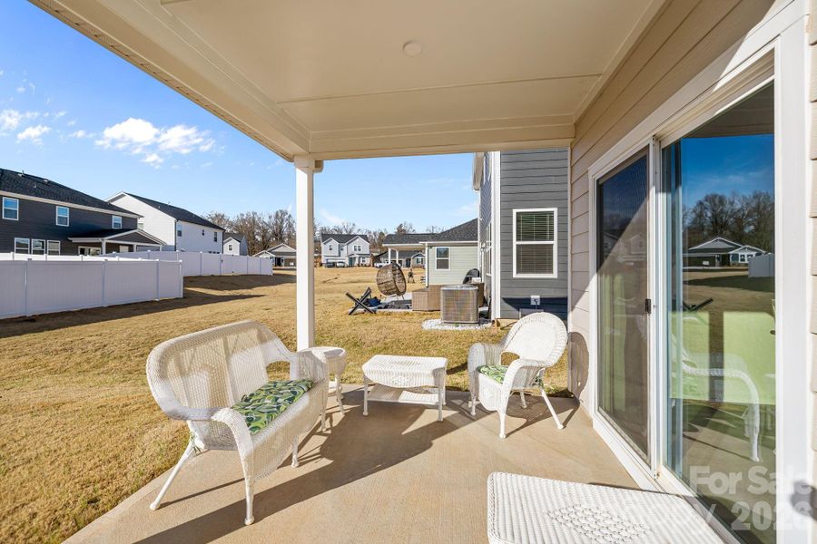 Exterior details and patio area of a home in Sheffield, Indian Trail (Image 29).