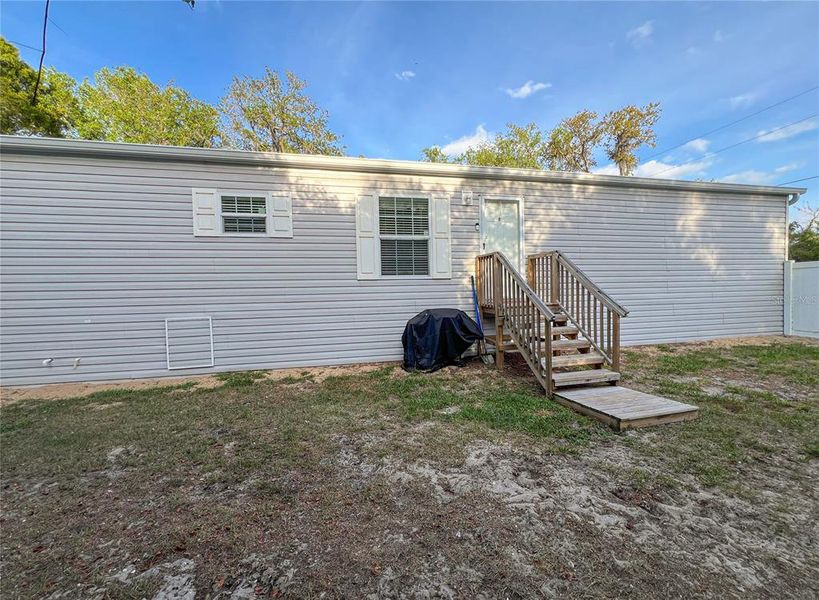 Exterior details and patio area of a home in , New Port Richey (Image 15).