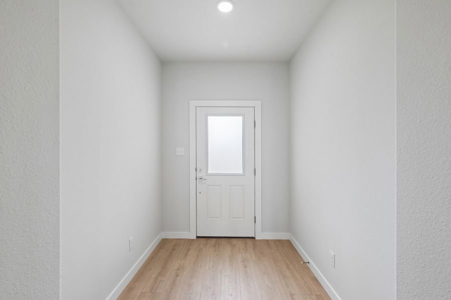 Foyer in the Hayden home plan by Trophy Signature Homes