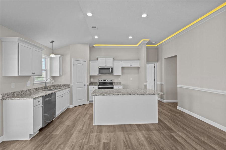 Representative furnished interior of a home built from the Brentwood by Enchanted Homes in Lonesome Dove, San Antonio (Image 7).