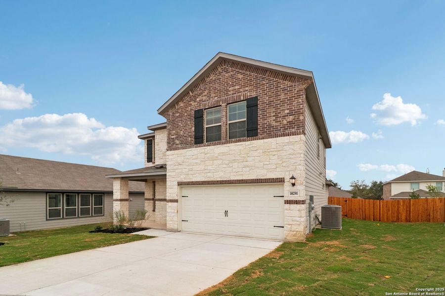Front exterior of a new home in Royal Crest, San Antonio, TX, highlighting curb appeal (Image 1). Front exterior of a new home in Royal Crest, San Antonio, TX, highlighting curb appeal (Image 1).